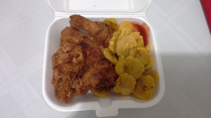 Fried chicken and tostones (fried plaintain slices) for $3